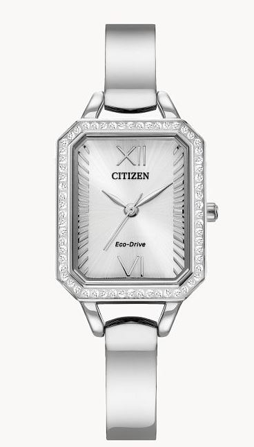Citizen Corso stainless steel 40mm case having a silver Roman dail a crystal accented bezel and mineral crystal. The watch has an Eco Drive movement and a stainless steel bangle and link bracelet.
