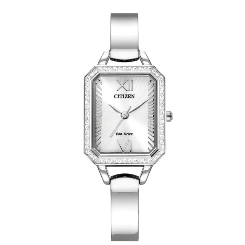 Citizen Corso stainless steel 40mm case having a silver Roman dail a crystal accented bezel and mineral crystal. The watch has an Eco Drive movement and a stainless steel bangle and link bracelet.