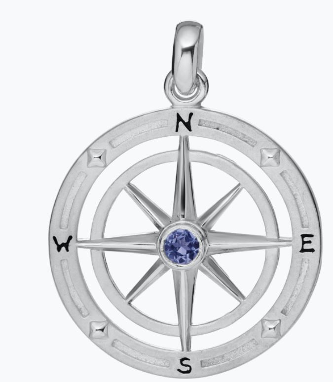 Sterling Silver Compass Rose Pendant With One Faceted Blue Sapphire Bezel Set In Center On An 18 Inch Rolo Chain.