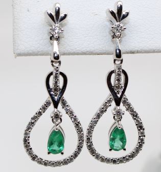 14 Karat White Gold Emerald And Diamond Earrings