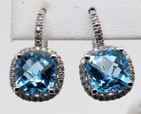 14 karat white gold blue topaz and diamond earrings