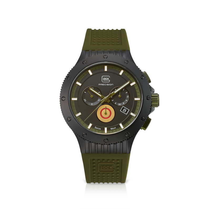 Glock Timepiece Having A 44 mm Black Titanium Case With A Black Marker Date Dial With 3 Sub Dials  One Is The Back Of A Shell Casing  A Black Unidirectional Bezel And A Sapphire Crystal