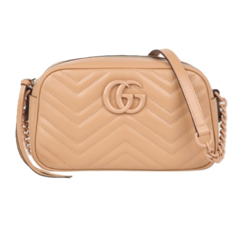 FINAL SALE Gucci Marmont Camera Bag                 Beige matelasse chevron leather  beige brass hardware with ceramic effect finish  Double G  Interior open pocket  Adjustable chain & leather shoulder strap  Zip closure    9.5” W x 5.9” H  x 3.1” D