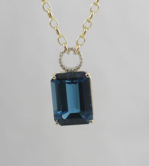 Blue Topaz And Diamond Necklace