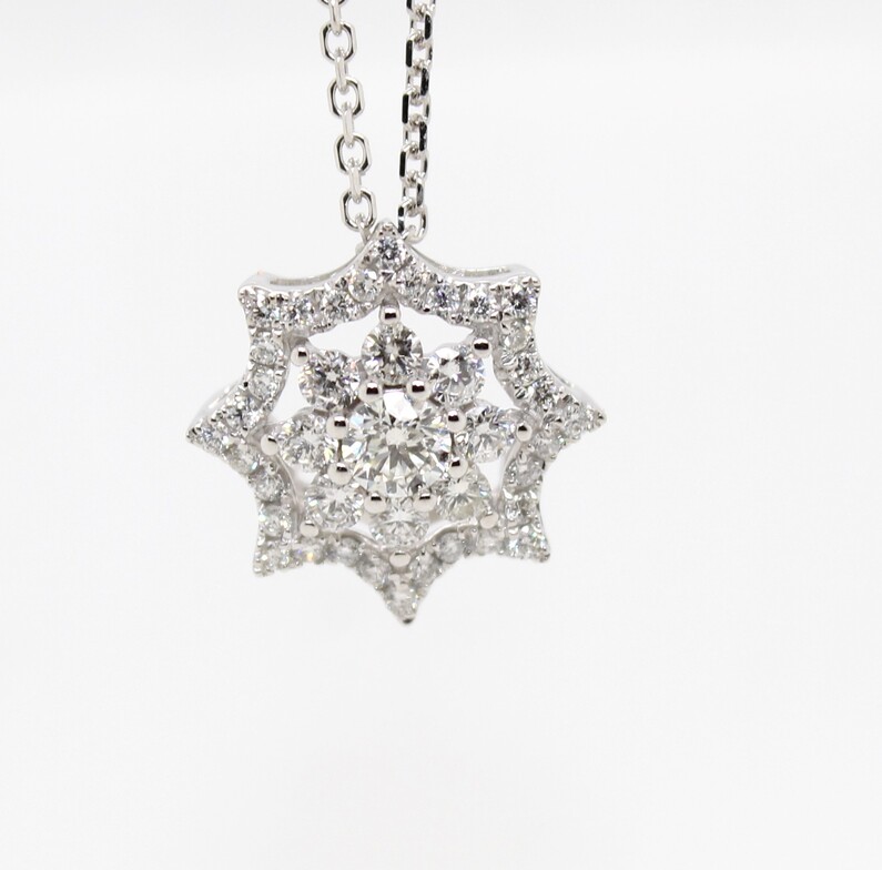 Namdar 14 Karat White Gold Diamond Cluster Pendant Suspended On A 14 Karat White Gold Curb Link Chain Measuring 16 Inches