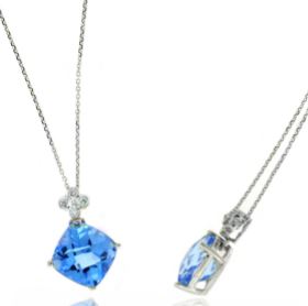 14 Karat White Gold Diamond And Blue Topaz Pendant Suspended On A 16" Dc Oval Link Chain With A Spring Ring Clasp