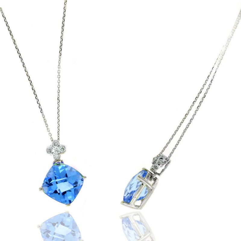 14 Karat White Gold Diamond And Blue Topaz Pendant Suspended On A 16" Dc Oval Link Chain With A Spring Ring Clasp