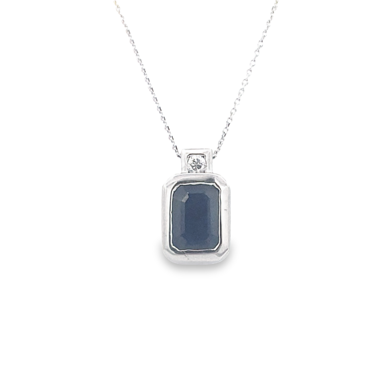 14 Karat White Gold Blue Sapphire And Diamond Pendant Suspended On A 16" Chain