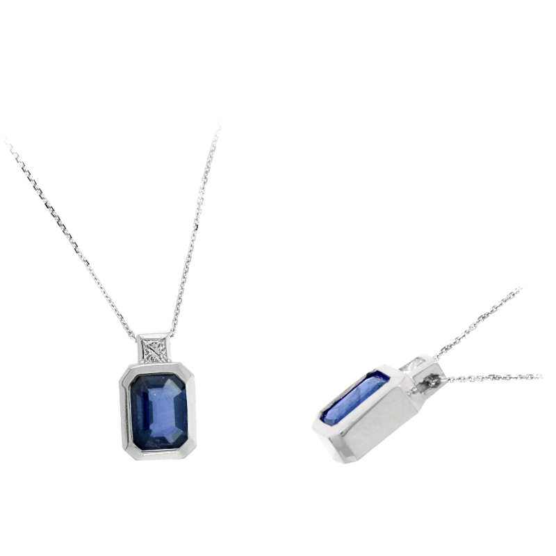 14 Karat White Gold Blue Sapphire And Diamond Pendant Suspended On A 16" Chain