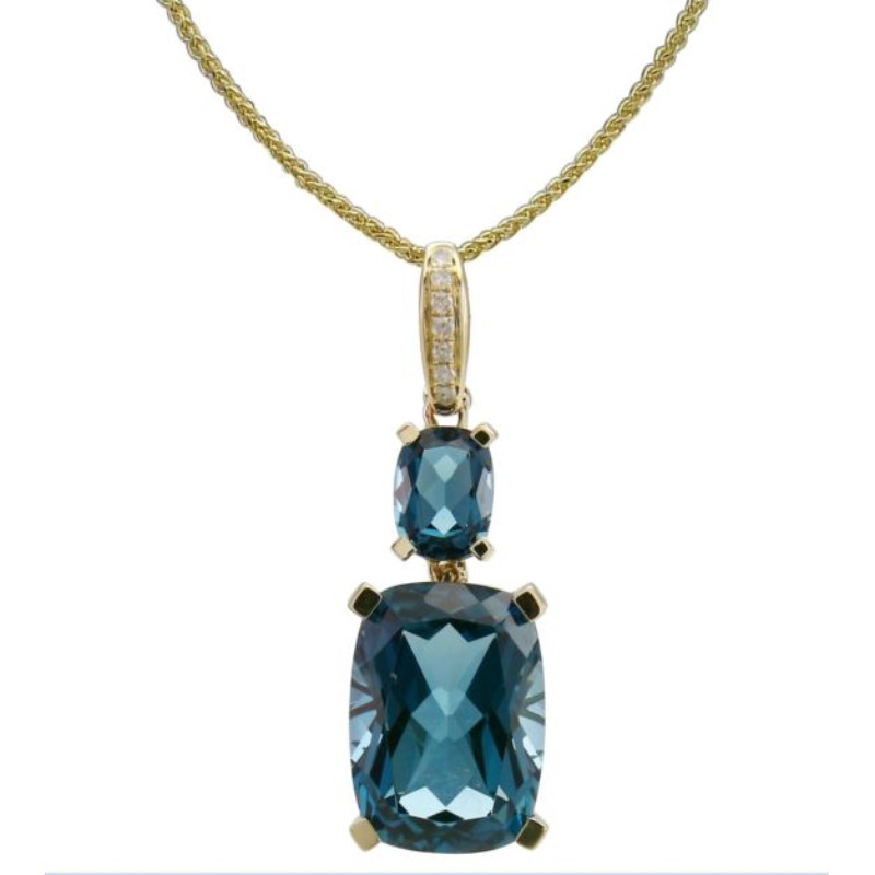 Blue Topaz And Diamond Pendant On An 18 Inch Chain Adjustable To 16 Inches