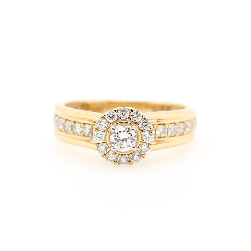 The ring contains 1 full cut diamond prong set in center surrounded by 12 full cut diamonds prong set. The shank has 8 full cut diamonds prong set on either side. Total of 29 full cut diamon