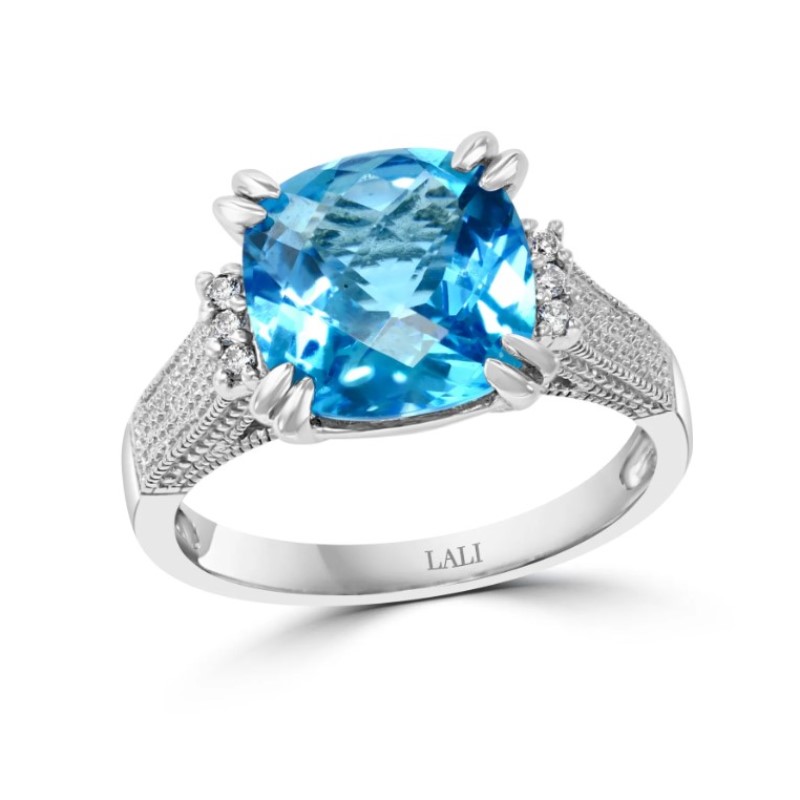 Blue Topaz And Diamond Ring