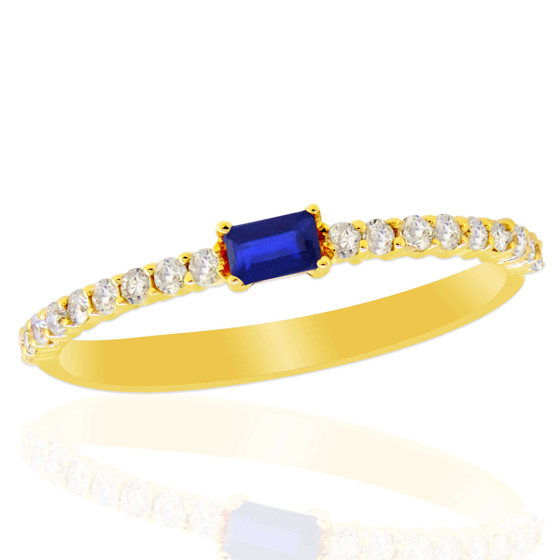 The ring contains 1 baguette cut sapphire prong set in the center with 9 full cut diamonds prong set on either side of center. Blue sapphire approximately = .12ctw. 18 diamonds approximately = .18