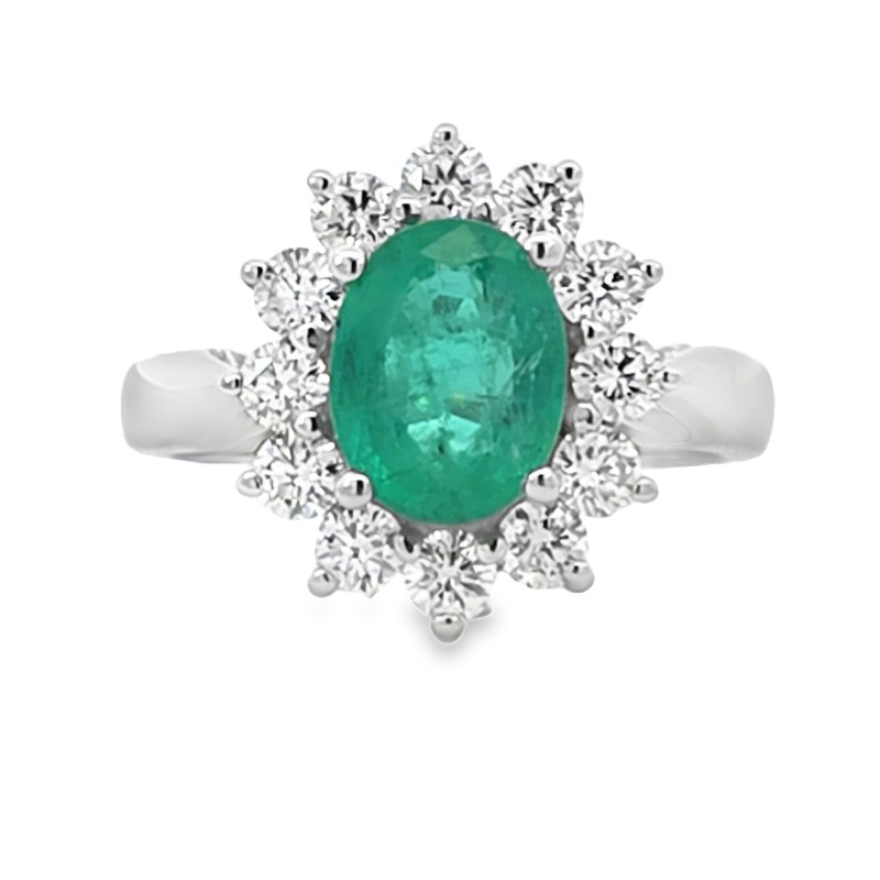 Oval Emerald And Diamond Halo Ring