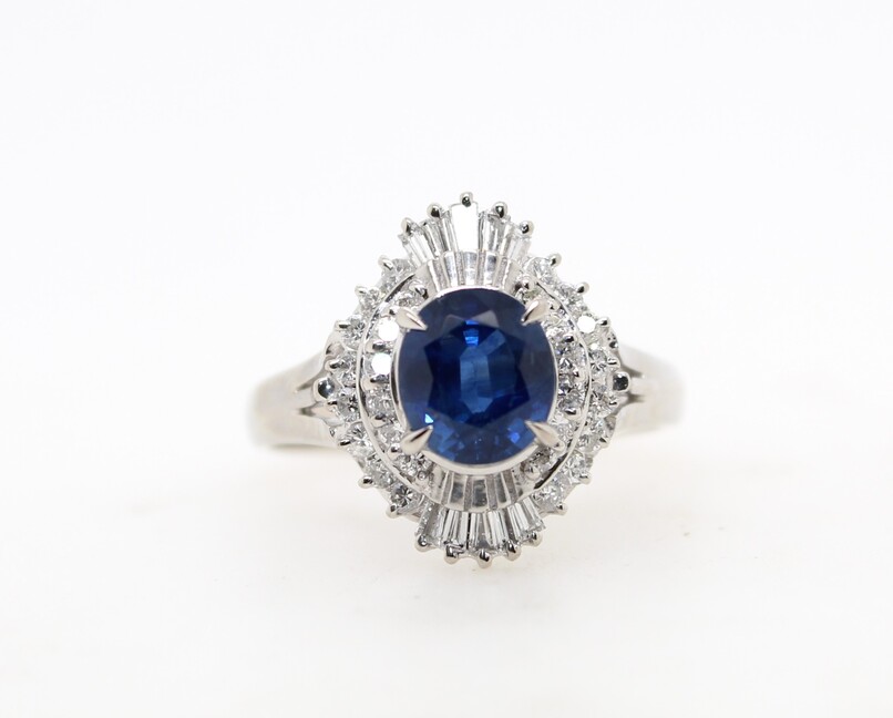 Estate platinum oval blue sapphire and diamond ring