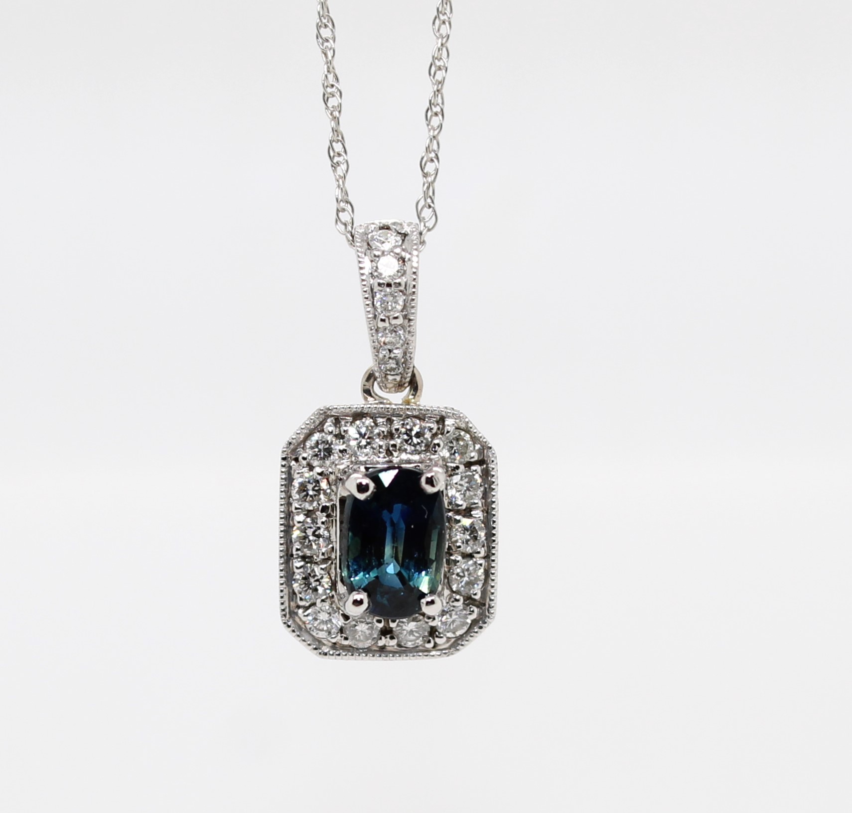 14 Karat White Gold Natural Blue Sapphire And Diamond Pendant