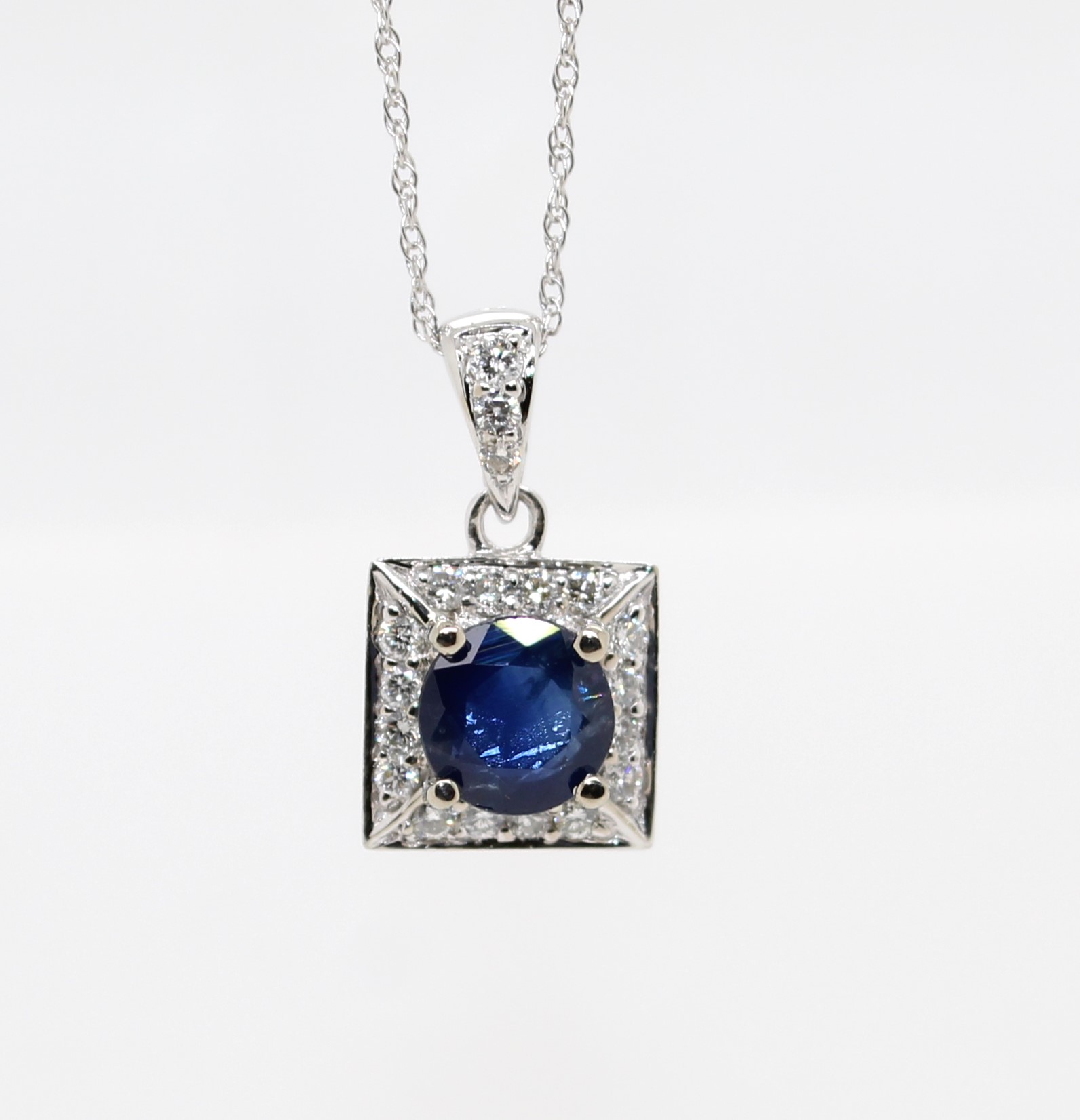 14 Karat White Gold Natural Blue Sapphire And Diamond Pendant