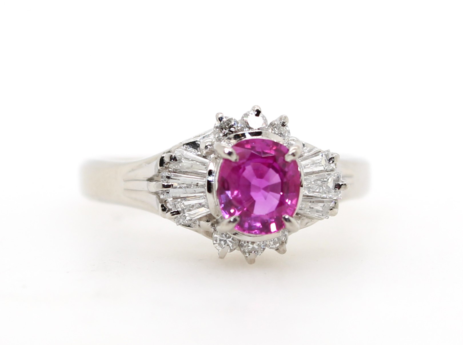 Estate platinum oval ruby and diamond ring