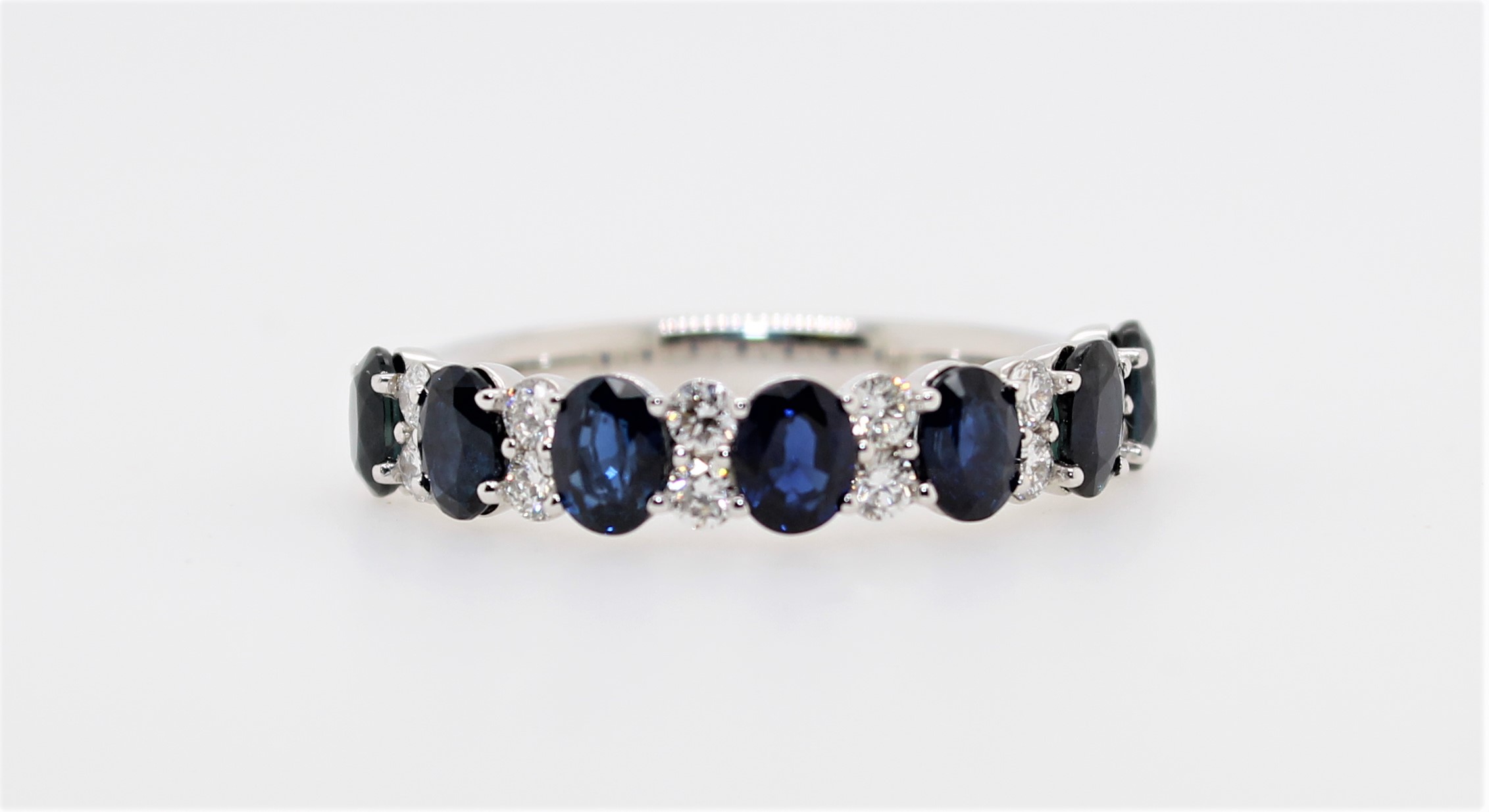 14 Karat White Gold Blue Sapphire And Diamond Band