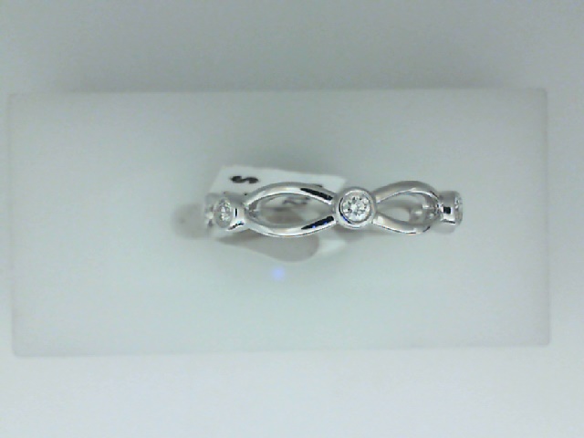 14K WHITE GOLD OPEN WAVE RING WITH .12CTTW ROUND I1 CLARITY & HI COLOR BEZEL SET DIAMONDS