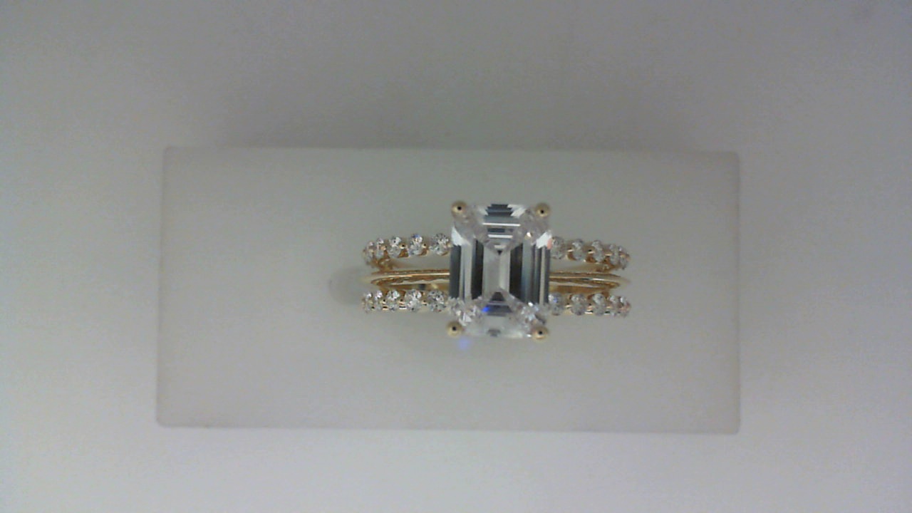 14K YELLOW GOLD SPLIT SHNAK SEMI MOUNTING WITH .54CTTW ROUND SI CLARITY & G COLOR DIAMONDS SET IN THE SPLIT SHANK AND HIDDEN HALO (FOR A 2 CT EMERALD CENTER)