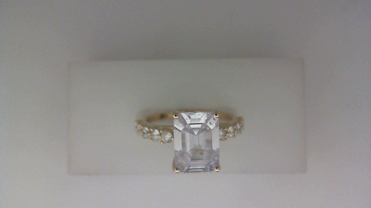 14K YELLOW GOLD FOUR PRONG TRELLIS HEAD SEMI MOUNTING WITH .63CTTW ROUND SI CLARITY & G COLOR DIAMONDS SET DOWN THE SHANK (FOR A 3CT EMERALD)