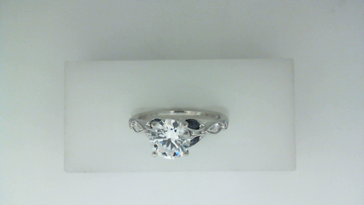 14K WHITE GOLD FOUR PRONG SEMI MOUNTING WITH .18CTTW ROUND AND MARQUISE SHAPED SI CLARITY & G COLOR DIAMONDS AND SAPPHIRES SET IN THE BEADED BEZEL SHANK AND UNDER THE HEAD