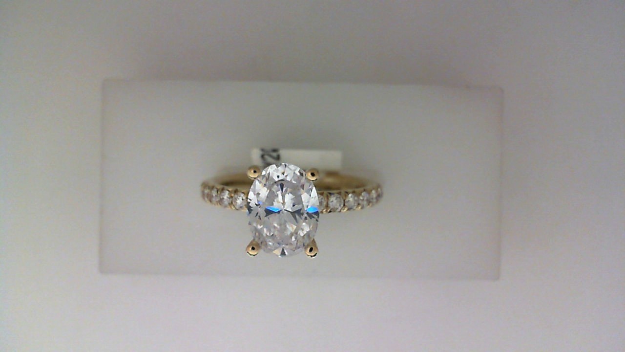 14K YELLOW GOLD FOUR PRONG SEMI MOUNTING WITH .52CTTW ROUND SI CLARITY & G COLOR DIAMONDS SET DOWN THE SHANK
