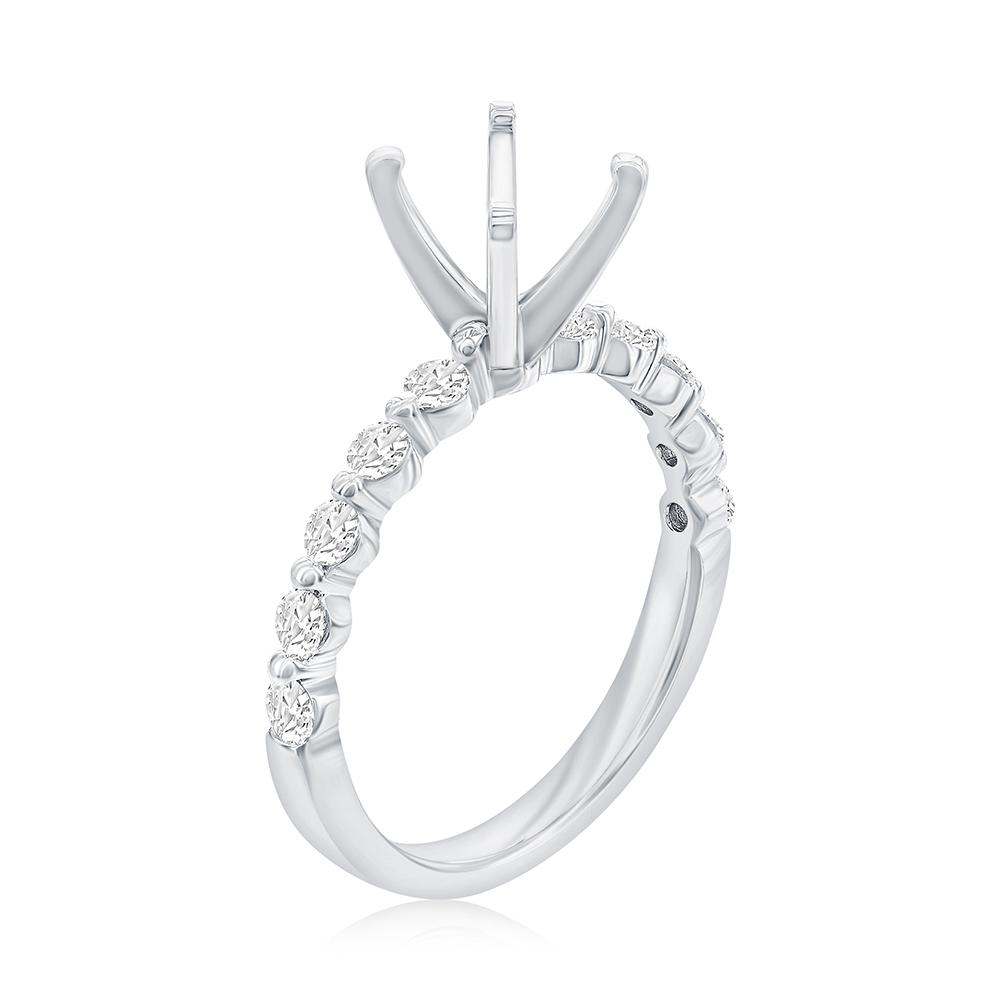 14K WHITE GOLD FOUR PRONG ROUND SEMI MOUNTING WITH (10) .38CTTW ROUND SI CLARITY & G COLOR DIAMONDS SET IN A ONE PRONG SETTING DOWN THE SHANK