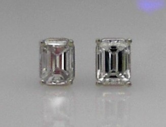 14K WHITE GOLD .97CTTW EMERALD CUT DIAMOND STUD EARRINGS SET IN FOUR PRONG THREADED POSTS AND BACKS