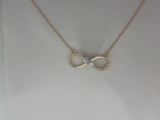 14K YELLOW GOLD INFINITY PENDANT WITH .10CTTW ROUND I1 CLARITY & HI COLOR DIAMONDS ON A PENDANT CHAIN