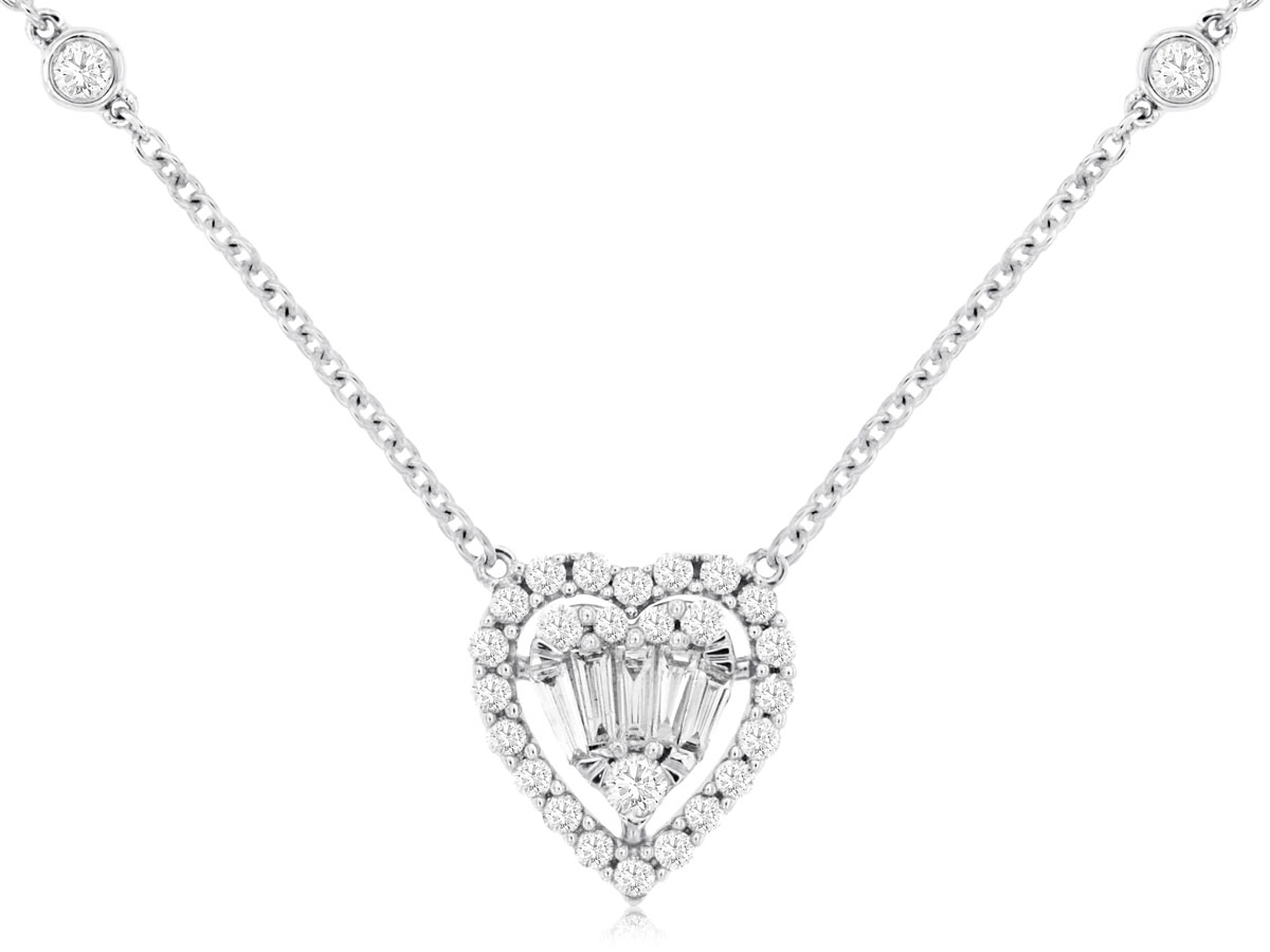 14K YELLOW GOLD CABLE CHAIN WITH A HEART PEDNAT SET WITH .32CTTW ROUND AND BAGUETTE I1 CLARITY & HI COLOR DIAMONDS AND BEZEL SET DIAMONDS SETINTHE CHAIN
