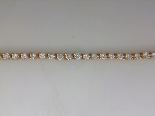 14K YELLOW GOLD 5.65CTTW IN LINE BRACELET WITH 43 ROUND BRILLIANT VS2/SI1 CLARITY & HI COLOR  DIAMONDS SET IN THREE PRONG BASKETS