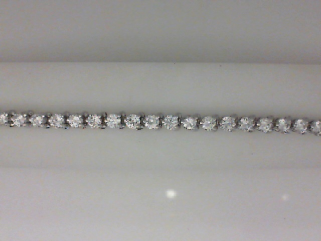 14K WHITE GOLD IN LINE BRACELET WITH 5.65CTTW ROUND VS2/SI1 CLARITY & HI COLOR DIAMONDS SET IN THREE PRONG BASKET SETTINGS