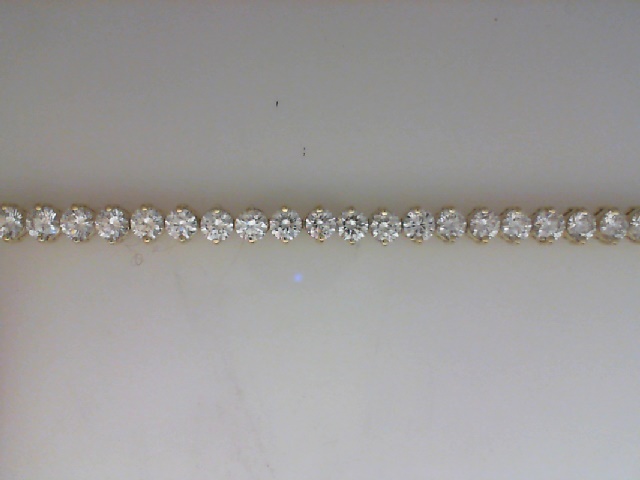 18K YELLOW GOLD 9.35CTTW IN LINE BRACELET WITH 45 ROUND BRILLIANT VS CLARITY & FG COLOR  DIAMONDS SET IN TWO PRONG BASKETS