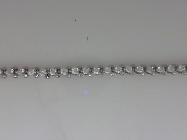 14K WHITE GOLD 2.00CTTW IN LINE BRACELET WITH 55 ROUND BRILLIANT VS2/SI1 CLARITY & HI COLOR  DIAMONDS SET IN THREE PRONG BASKETS