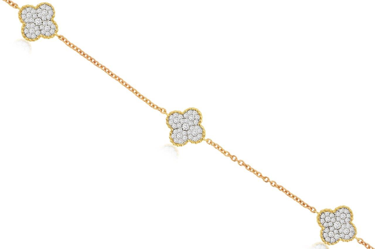 14K YELLOW GOLD 6.5/7" BRACELET WITH .35CTTW ROUND I1 CLARITY & HI COLOR DIAMONDS SET IN A TRIPLE CLOVER CLUSTER