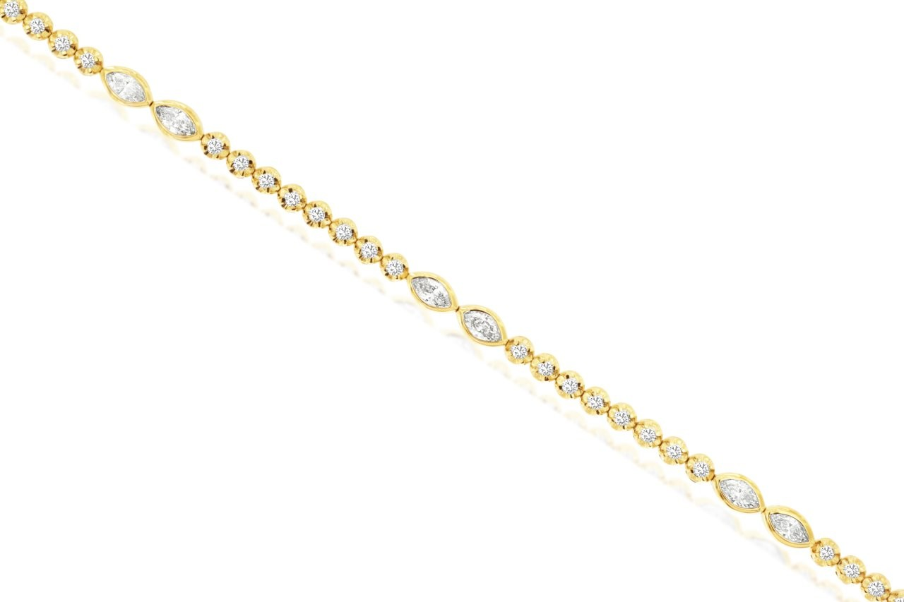 14K YELLOW GOLD IN LINE BRACELET WITH 1CTTW PRONG SET ROUND AND BEZEL SET MARQUISE I1 CLARITY & HI COLOR DIAMONDS