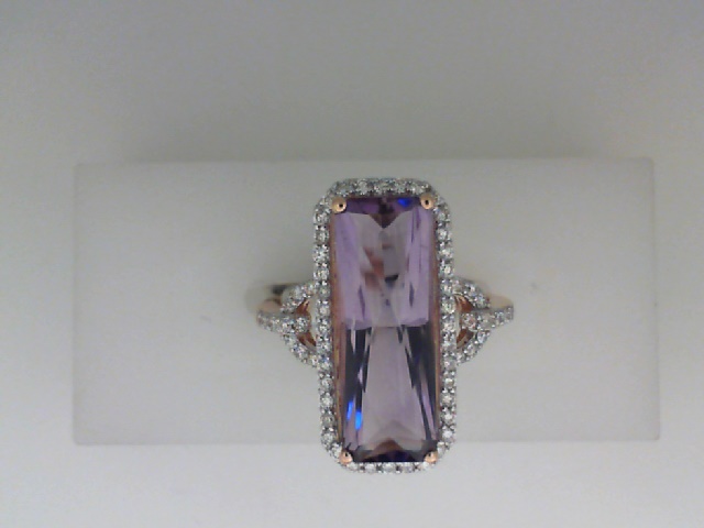 14K ROSE GOLD RING WITH A 4.7CT ELONGATED RECTANGLE AMETHYST WITH .41CTTW ROUND I1 CLARITY & HI COLOR DIAMONDS SET IN THE HALO AND SHANK