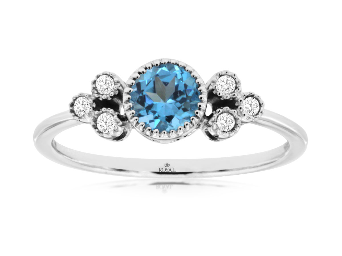 14K WHITE GOLD .55CTROUND BLUE TOPAZ RING WITH .07CTTW ROUND I1 CLARITY & HI COLOR DIAMONDS SET ON THE SIDES