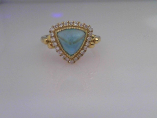 14K GREEN GOLD 2CT APATITE CABOCHON TRILLION RING WITH .24CTTW ROUND SI CLARITY & G COLOR DIAMONDS SET IN THE HALO