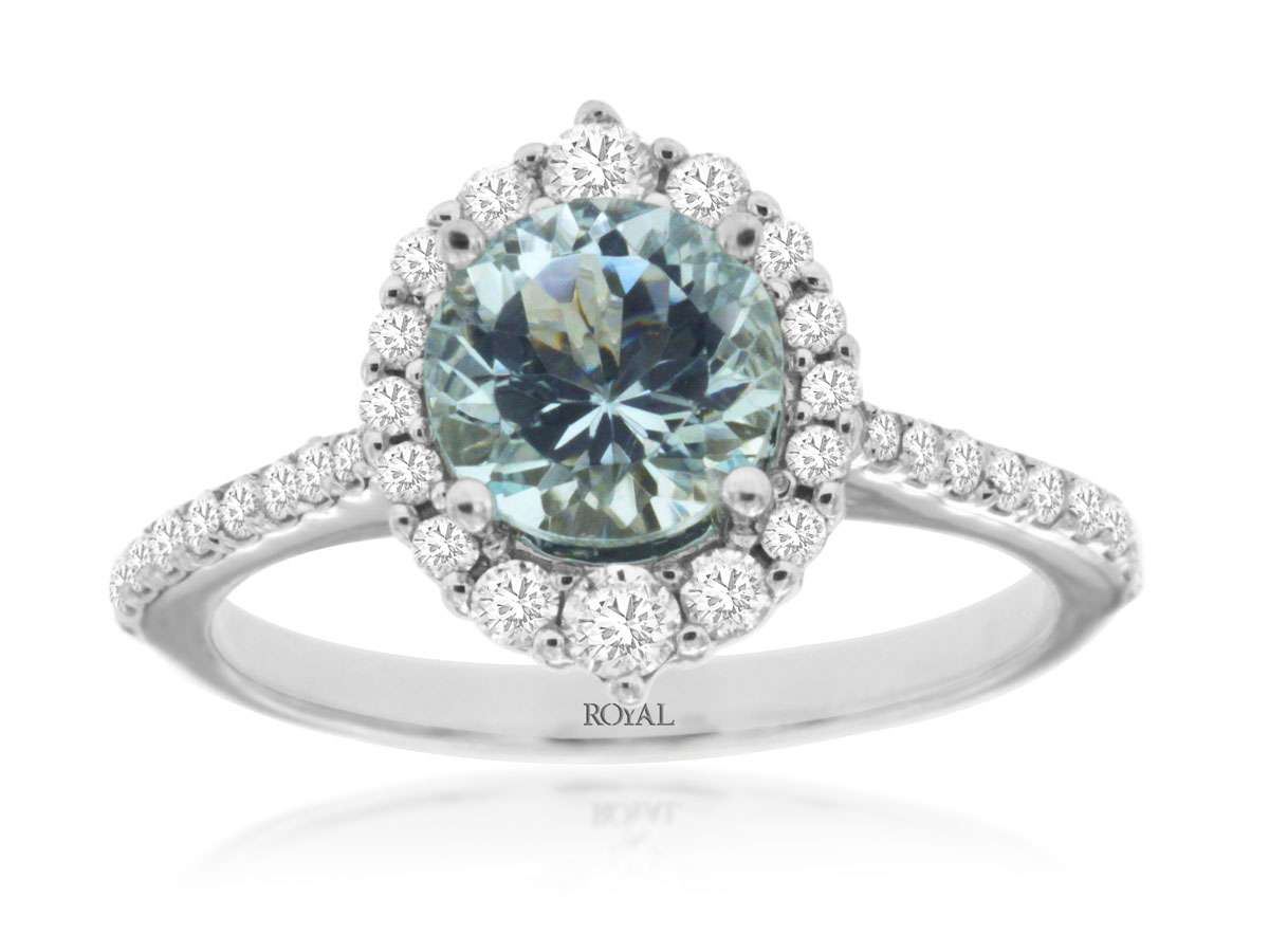 14K WHITE GOLD 1.15CT ROUND AQUAMARINE RING WITH .49CTTW ROUND I1 CLARITY & HI COLOR DIAMONDS SET IN THE OVAL SHAPED HALO AND DOWN THE SHANK