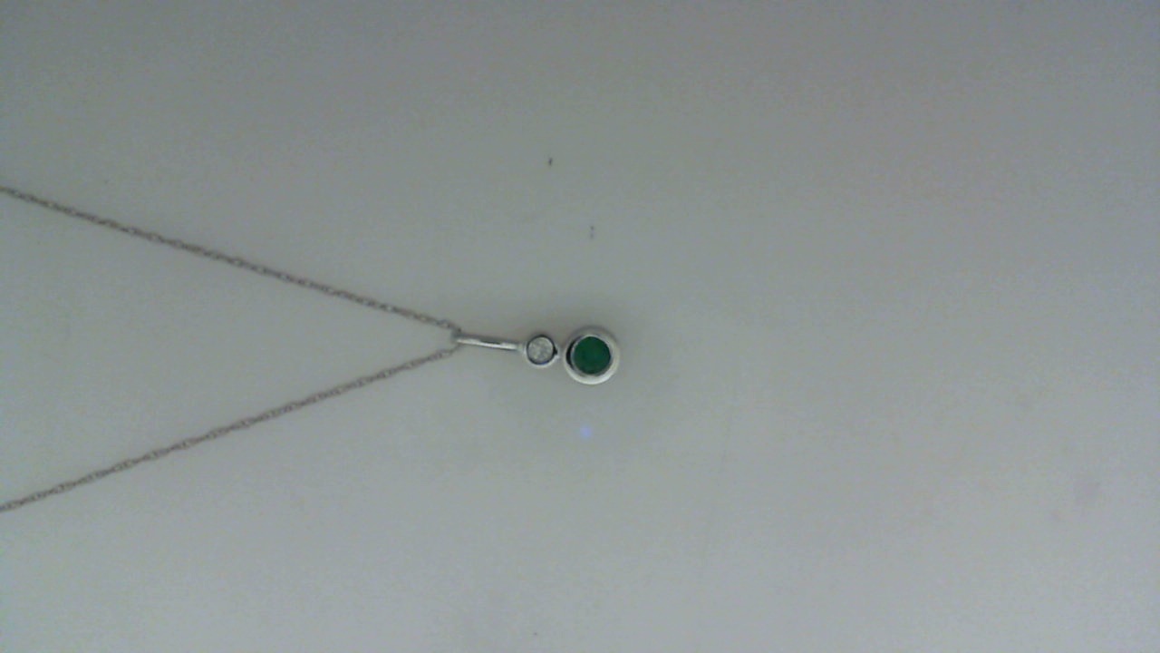 14K WHITE GOLD .15CT ROUND BEZEL SET EMERALD AND .03CT ROUND DIAMOND PENDANT ON AN 18