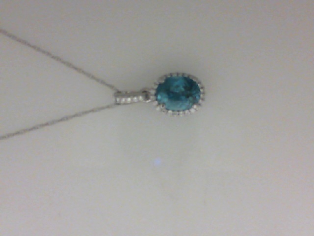 14K WHITE GOLD 1.98CT OVAL BLUE ZIRCON (8X6MM) PENDANT WITH .11CTTW ROUND SI CLARITY & GH COLOR DIAMONDS SET IN THE HALO AND BAIL ON AN 18