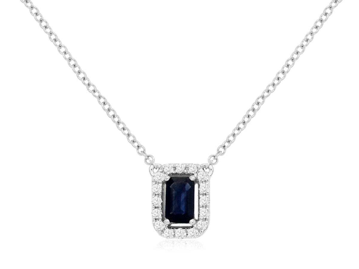 14K WHITE GOLD .37CT EMERALD CUT SAPPHIRE PENDANT WITH .11CTTW ROUND I1 CLARITY & HI COLOR DIAMONDS SET IN THE HALO ON A CABLE CHAIN