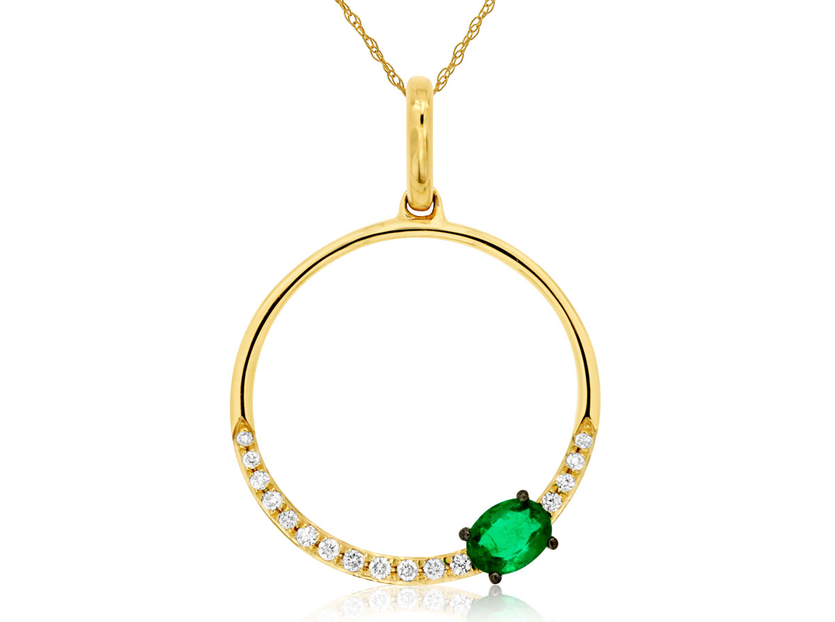 14K YELLOW GOLD OPEN CIRCLE PENDANT WITH A .20CT OVAL EMERALD AND .07CTTW ROUND I1 CLARITY & HI COLOR DIAMONDS ON A PENDANT CHAIN