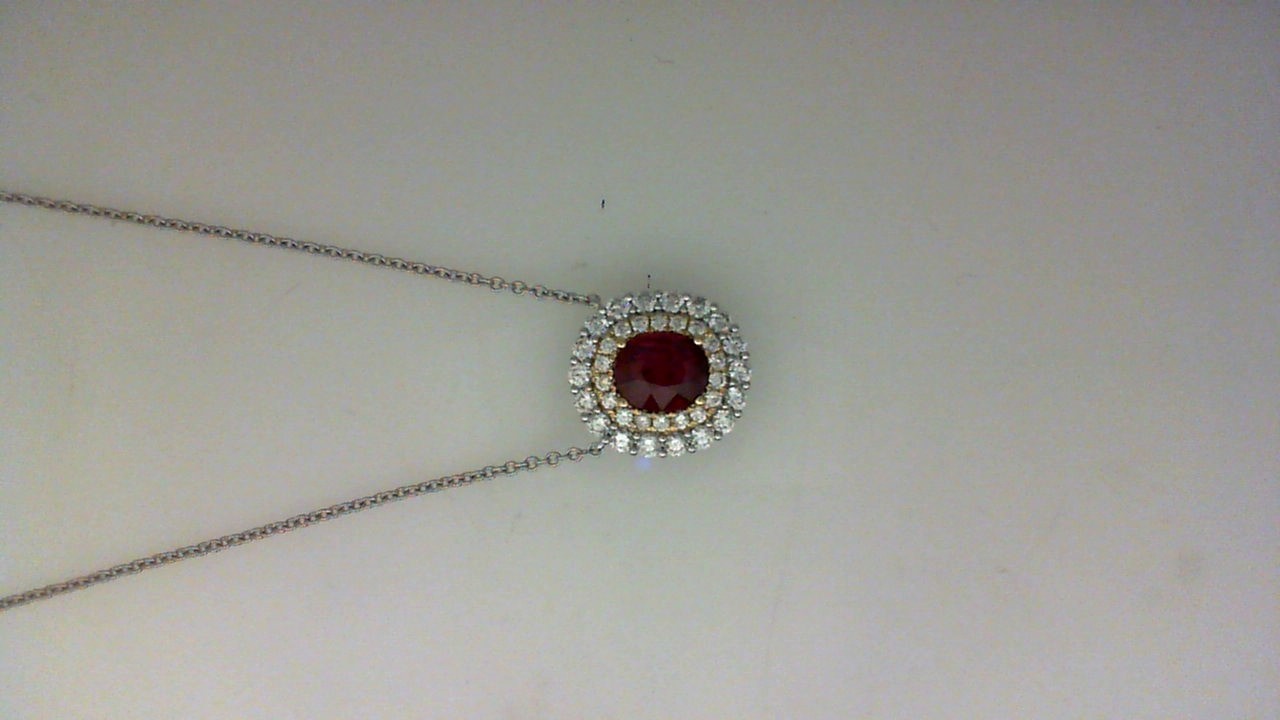 18K WHITE AND YELLOW 1.0CT OVAL RUBY PENDANT WITH .56CTTW ROUND SI CLARITY & G COLOR DIAMONDS SET IN THE DOUBLE HALO ON A 16