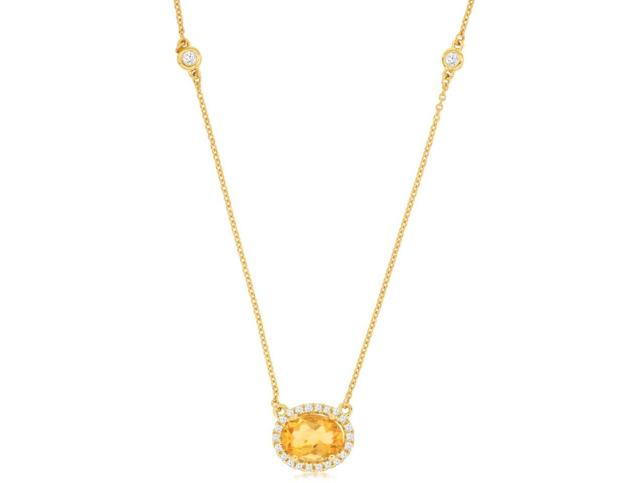 14K YELLOW GOLD .75CT OVAL CITRINE NECKALCE WITH .27CTTW ROUND I1 CLARITY & HI COLOR DIAMONDS SET IN THE HALO AND IN THE BEZELS IN THE CABLE CHAIN