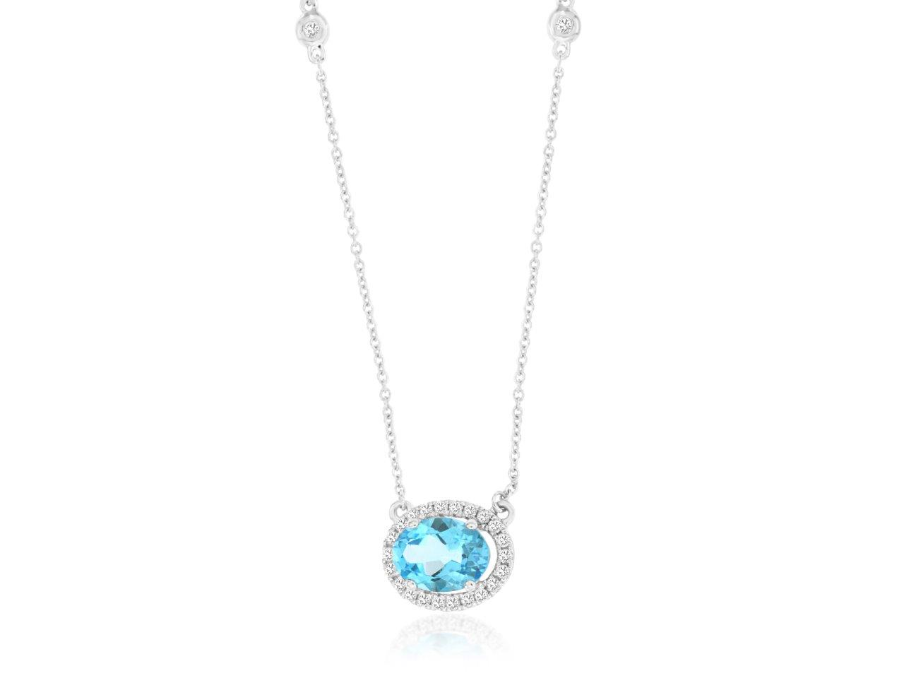 14K WHITE GOLD .95CT OVAL BLUE TOPAZ NECKLACE WITH .27CTTW ROUND I1 CLARITY & HI COLOR DIAMONDS SET IN THE HALO AND BEZELS IN THE CABLE CHAIN