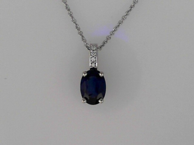 14K WHITE GOLD 1.03CT OVAL SAPPHIRE PENDANT WITH .01CTTW ROUND DIAMONDS SET IN THE BAIL ON AN 18